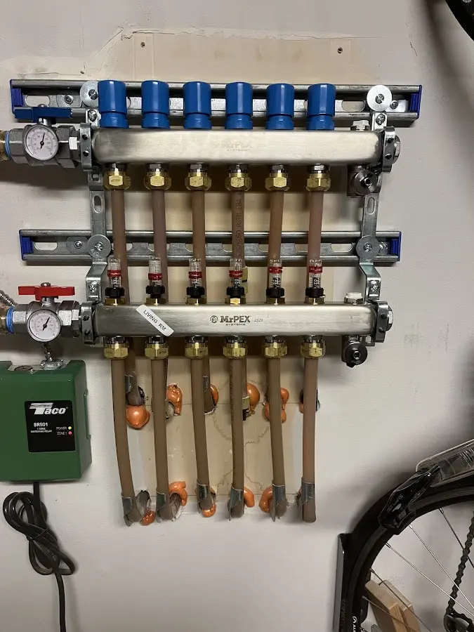 Plumber performing Gas Leak Detection at a residential property in Spring Arbor